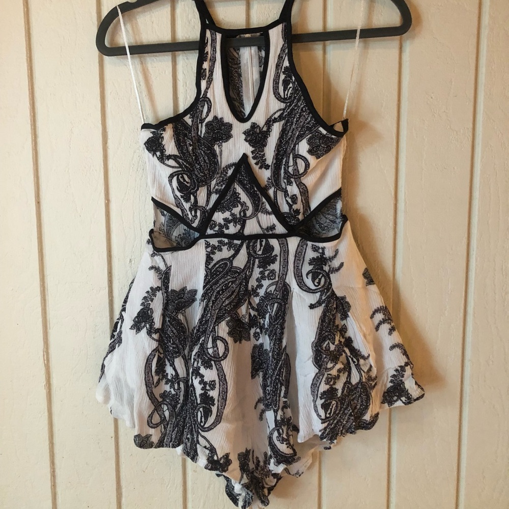 Flirty Romper W/ Side Cut-Outs